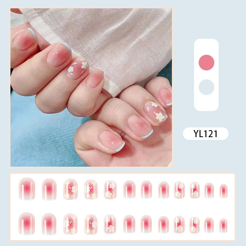 Kunstvolle Gel-Nägel mit zarten Blütenmotiven Brehn