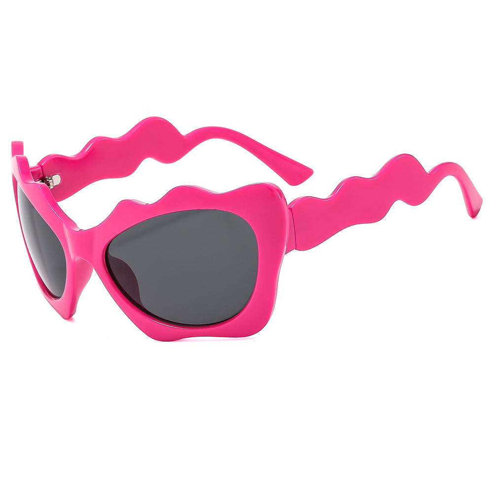 Damen Sonnenbrille im kreativen Wellen-Design Brehn