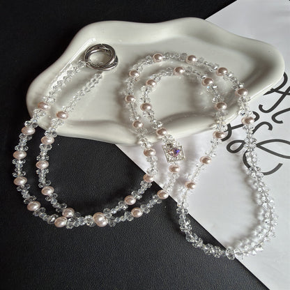 Eleganter Perlen- und Kristall-Brillenhalter Brehn