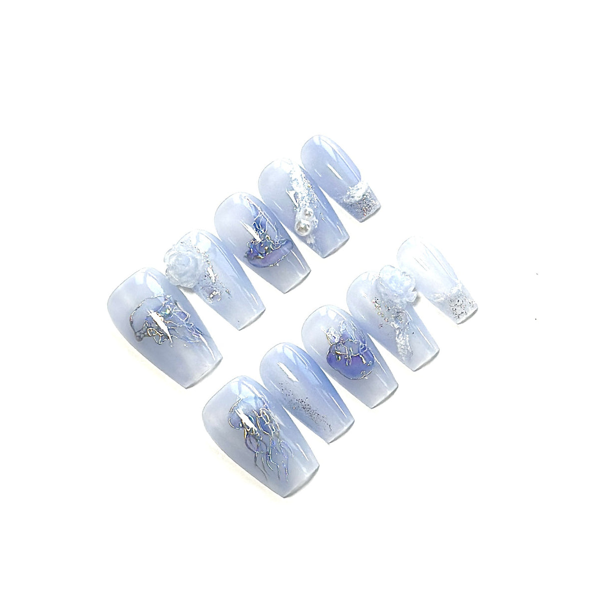 Künstlerisches Press-On Nagelset mit vom Meer inspirierten Designs