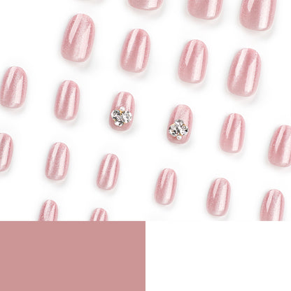 Kunstvolle Glitzer-Nagelverlängerungen mit eleganten Strass-Akzenten Brehn