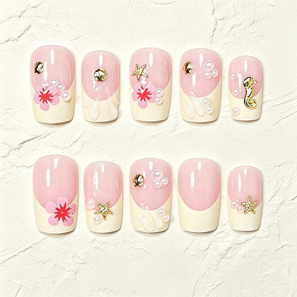 Tropische Muschel- und Blumen-Press-On-Nagelkunst Brehn