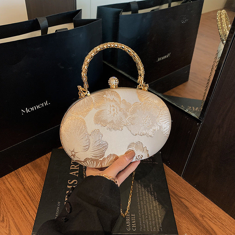 Elegante Blumen Abendtasche Brehn