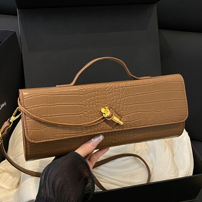 Elegante Handtasche mit Krokodiltextur