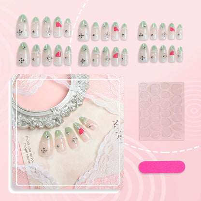 Dekoratives Press-On-Nagelset mit Frucht- und Edelsteinakzenten