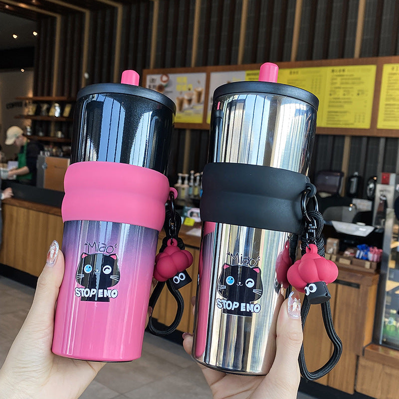 Damen verspielter Kaffeebecher mit Silikonhülle und integriertem Anhänger Brehn