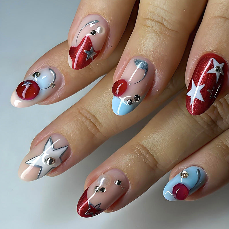 Kunstnagelset mit stilvollen Stern- und Fruchtmotiven Brehn