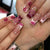 Kunstnagelset mit floralem Detail und Glitzereffekten Brehn
