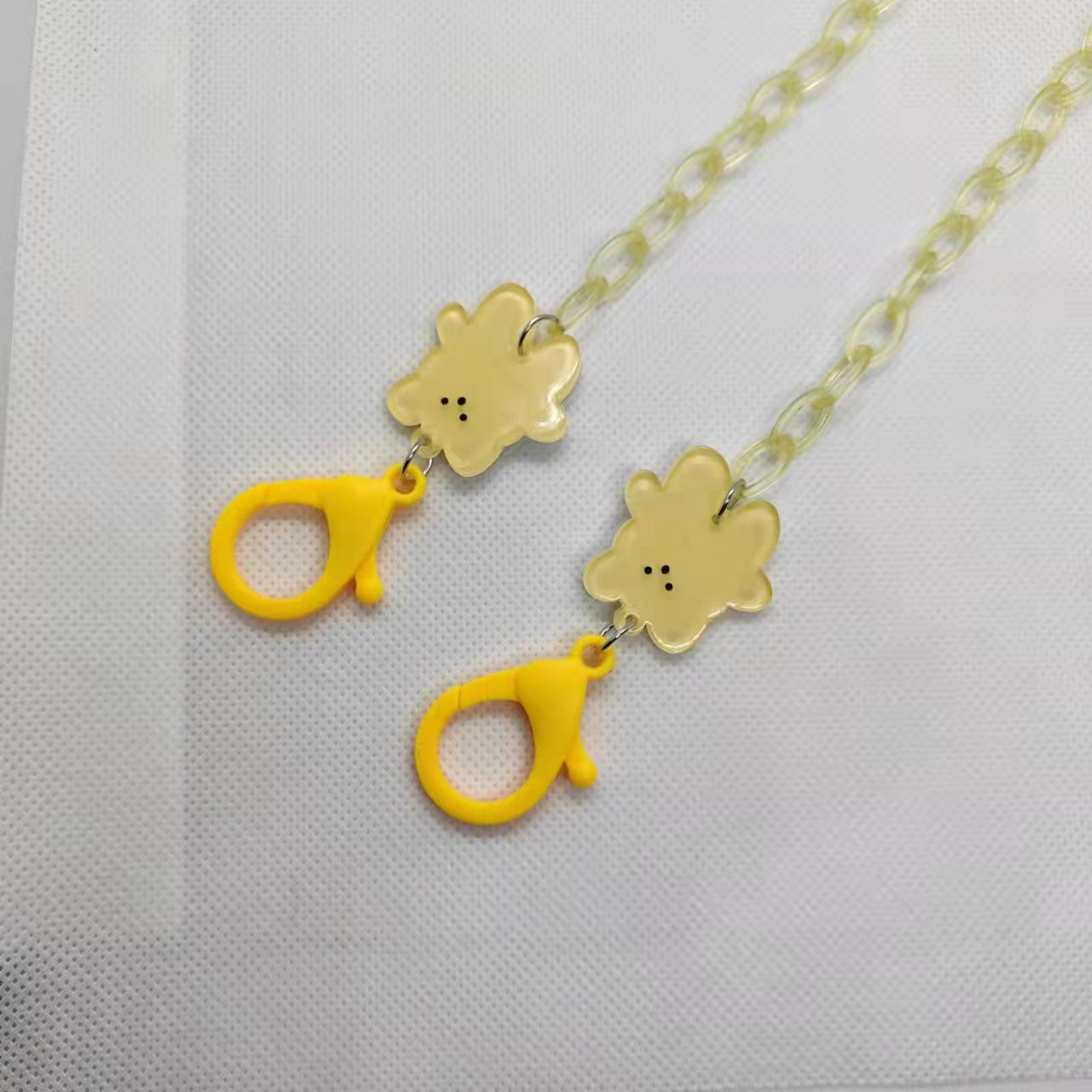 Verspielte Brillenhalterkette mit Blumenmotiv Brehn