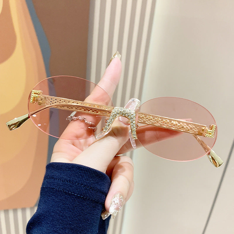 Damen Sonnenbrille mit glitzerndem Rahmen und ovalen Gläsern Brehn