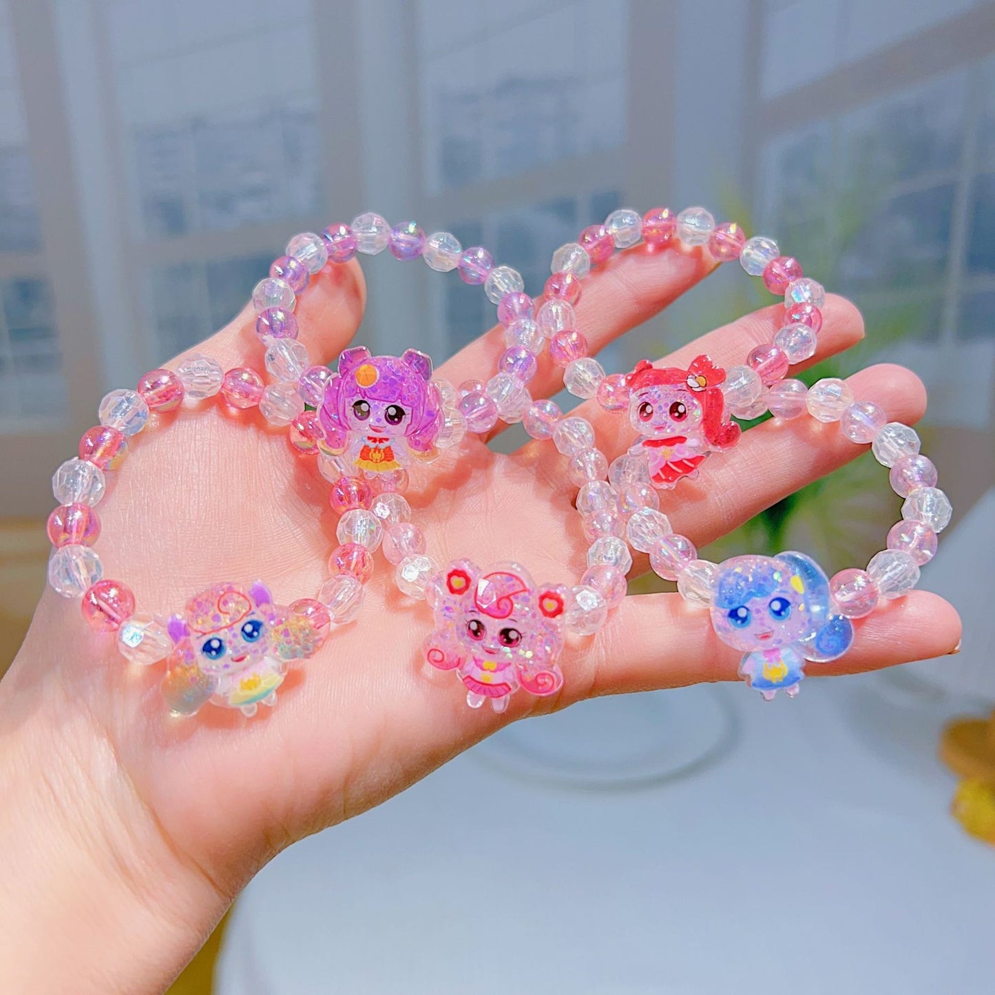 Verspieltes Armband mit Cartoon-Anhängern Brehn