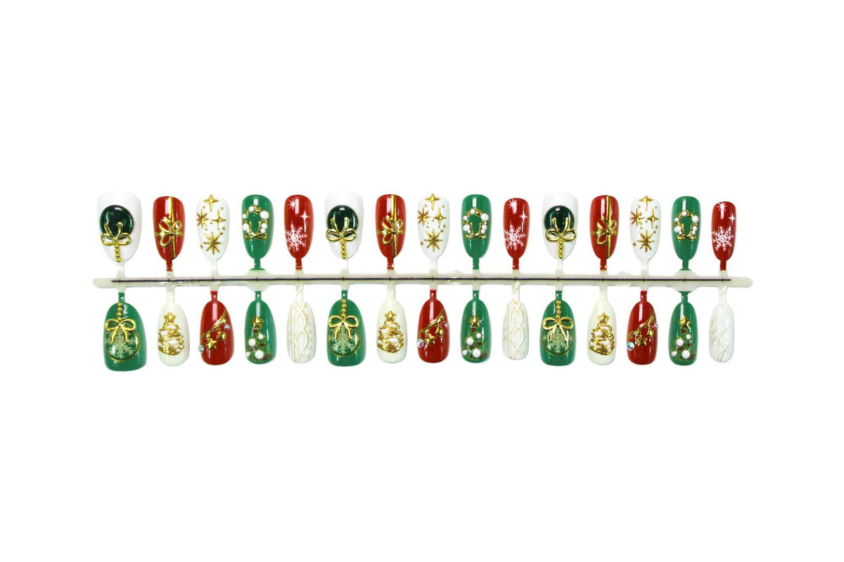 Kunstnagelset mit festlichen Weihnachtsmotiven und glamourösen Goldverzierungen Brehn