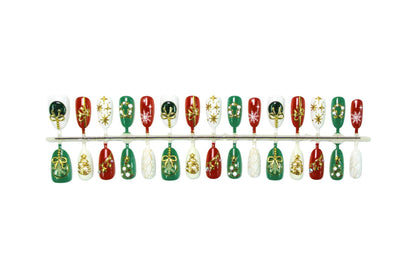 Kunstnagelset mit festlichen Weihnachtsmotiven und glamourösen Goldverzierungen Brehn