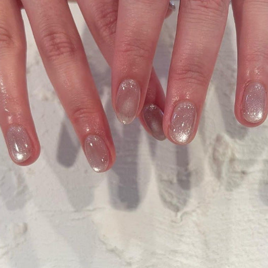 Kunstvolle Nagelverlängerungen mit Glitzer-Effekt Brehn