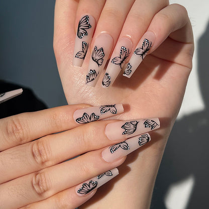 Kunstvolle Nagelverlängerungen mit Schmetterlingsdesign Brehn