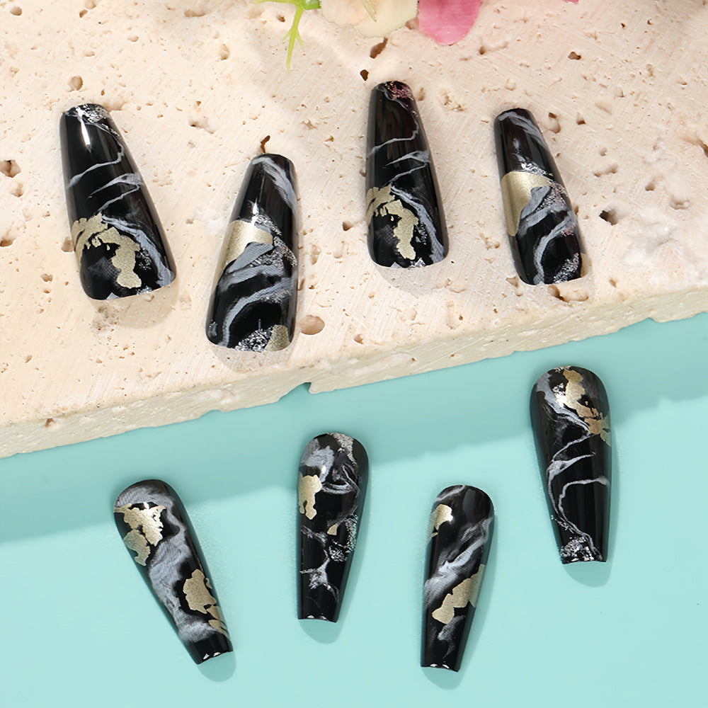 Kunstnägel im eleganten Marmor- und Gold-Design Brehn