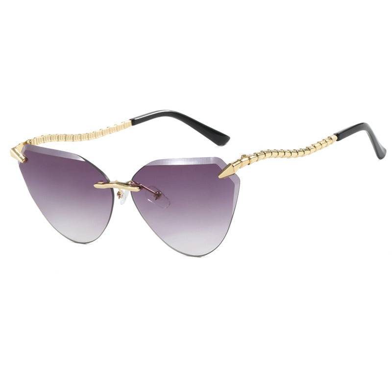 Damen Cat-Eye Sonnenbrille mit einzigartigem goldenen Rahmendesign und schützenden Gläsern Brehn