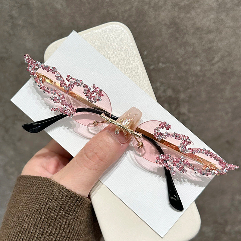 Glamouröse mit Strass verzierte Katzenaugen-Sonnenbrille