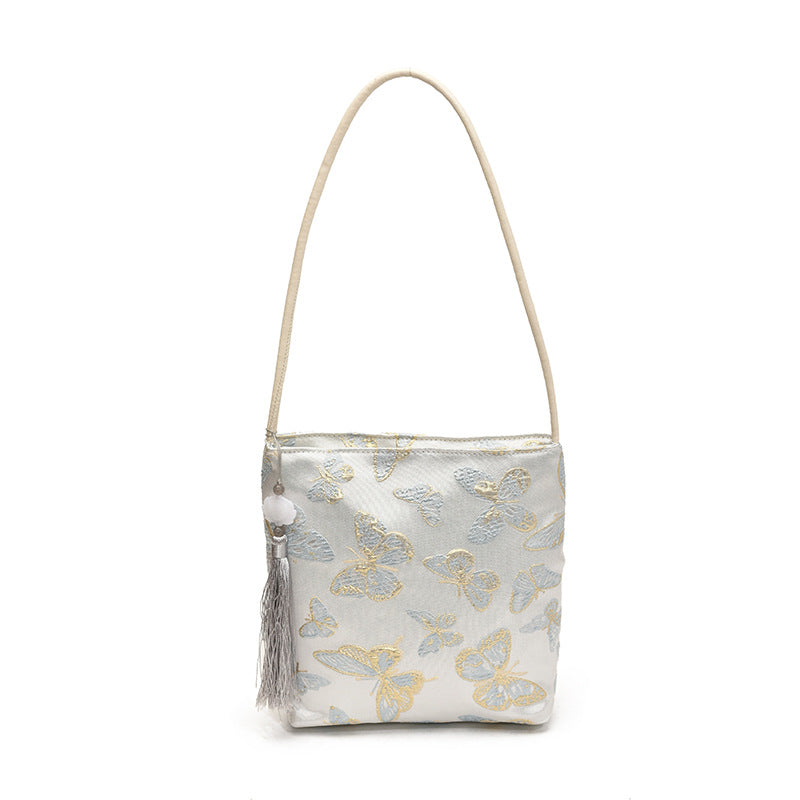 Elegante floral bedruckte Handtasche