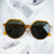 Damen Geometrische Sonnenbrille mit extravagantem Akzent Brehn