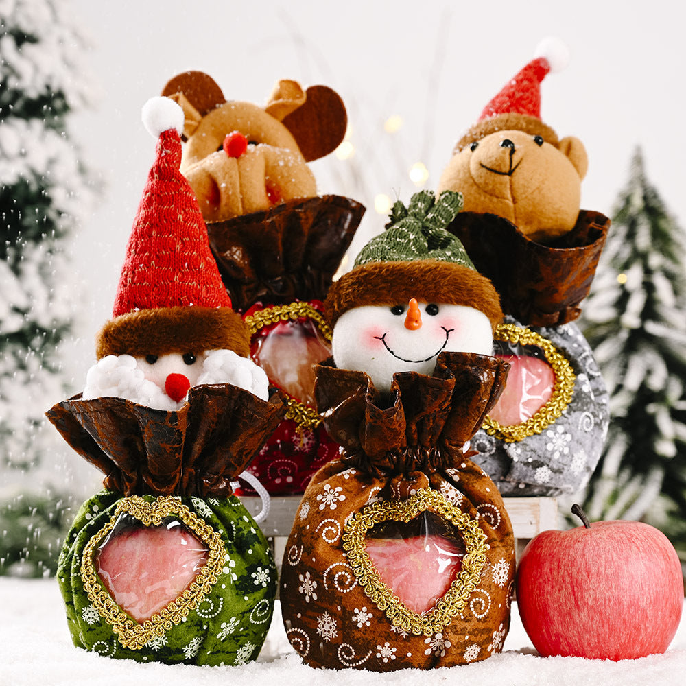 Niedliche Weihnachtsfigur mit Herzbeutel Brehn