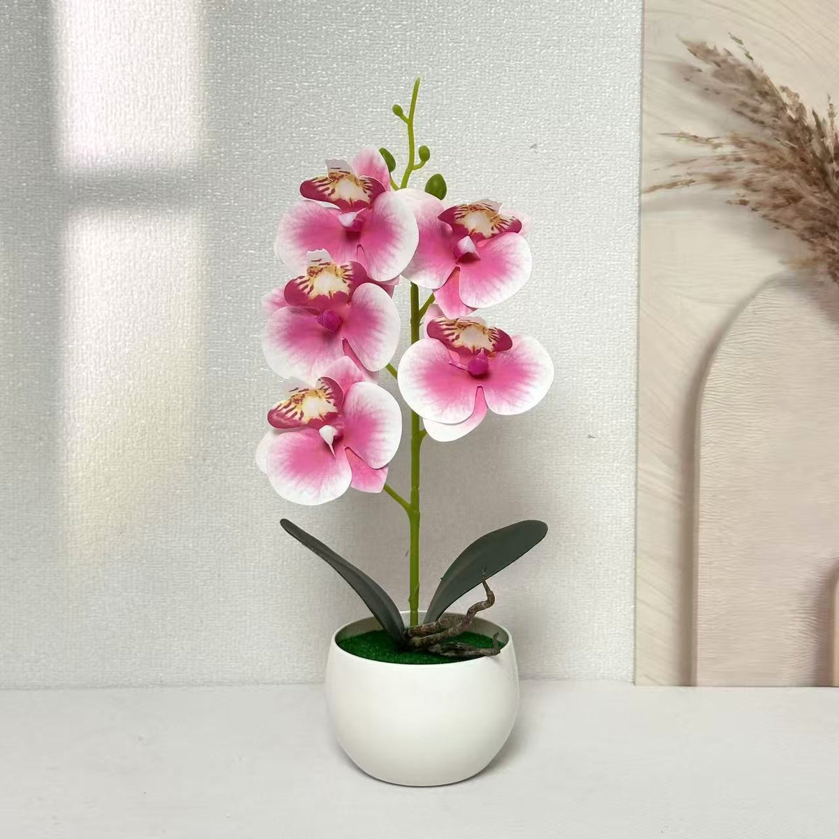 Realistische künstliche Orchideenpflanzenarrangement für die Innendekoration