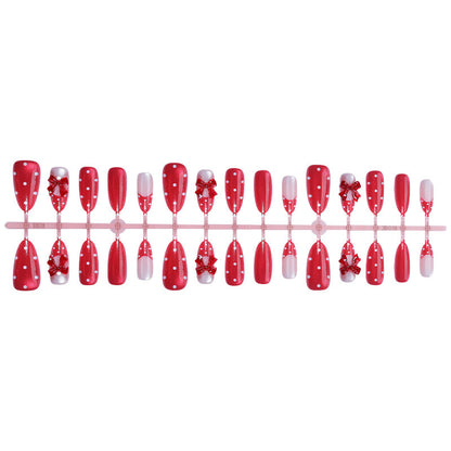 Charmantes dekoratives Press-On Nagelkunstset mit Schleifen- und Punkten-Design Brehn