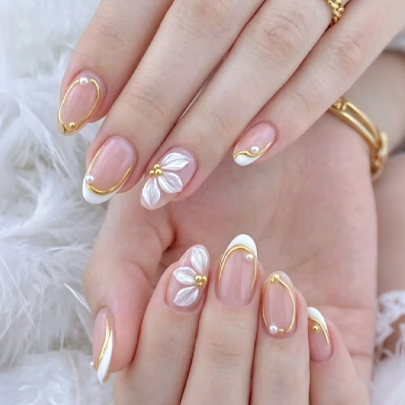 Elegantes Kunstnagelset mit romantischen Blumendekoren Brehn