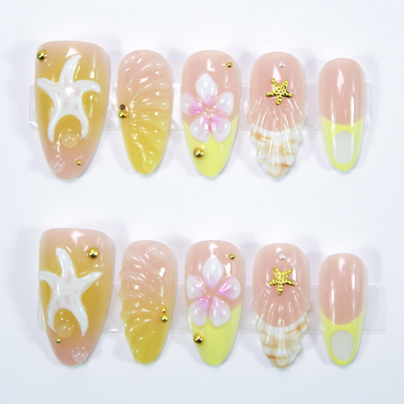 Kunstnagelset mit maritimen Muschel- und Blütenmotiven Brehn
