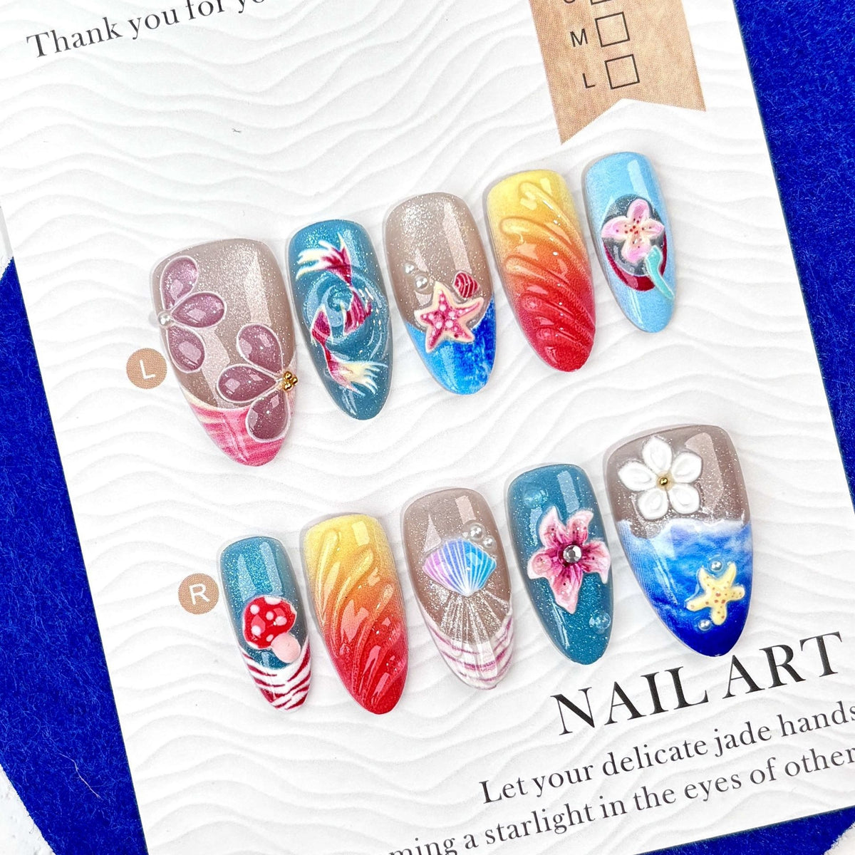 Kunstnagelset mit floralem Design und kreativem Glitzer Brehn
