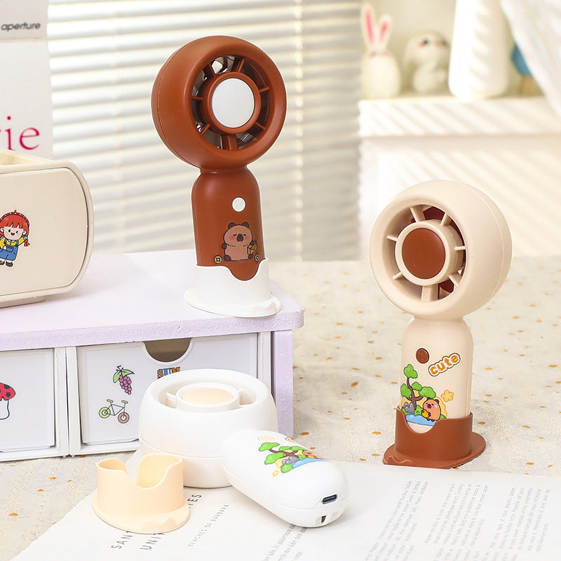 Frauen Handheld Mini-Ventilator mit USB-Ladefunktion und ergonomischem Design Brehn