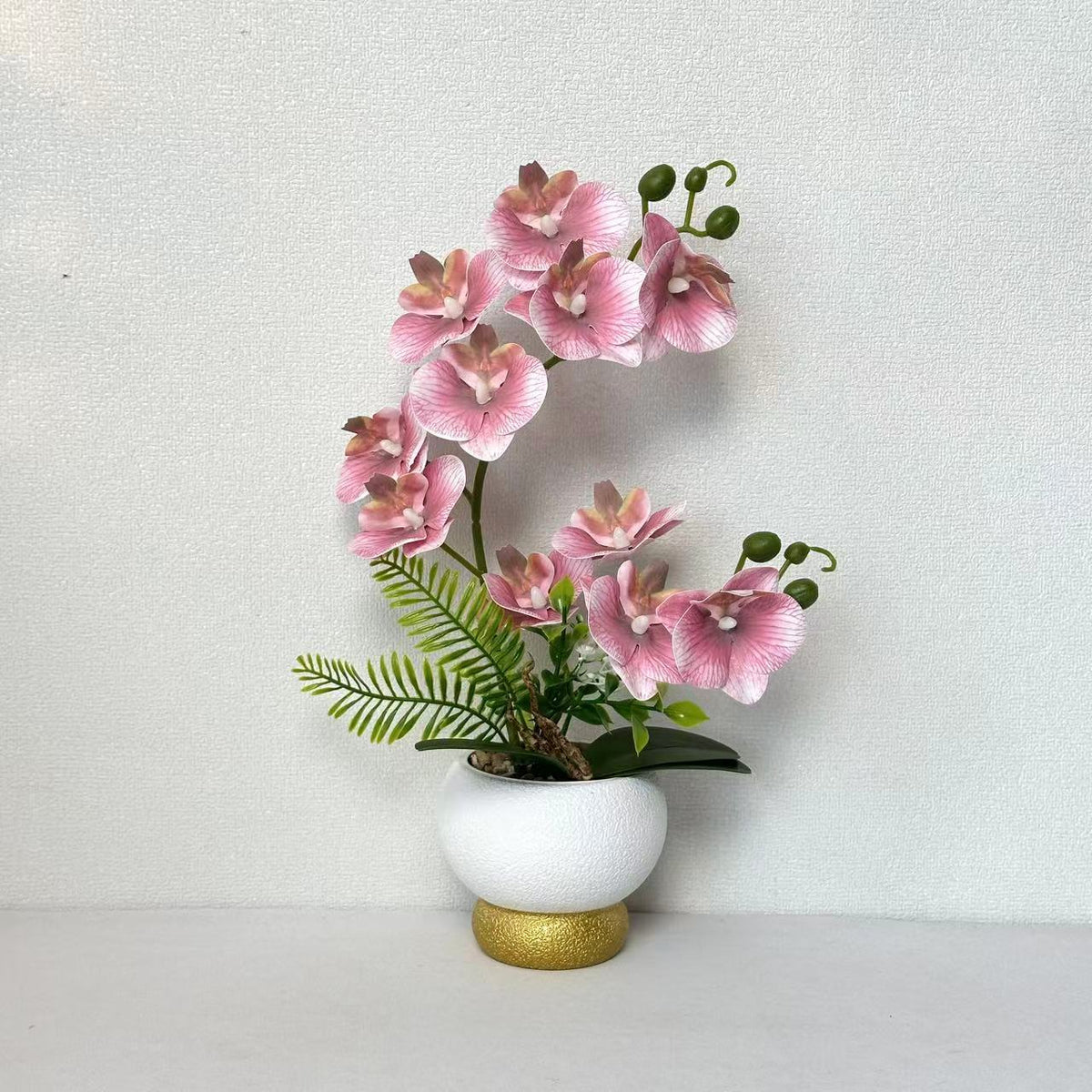 Künstliche Orchideenarrangement für Tischdekoration