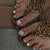Dekoratives Press-On Nagelkunst-Set mit Schmetterlings- und Edelsteinakzenten Brehn