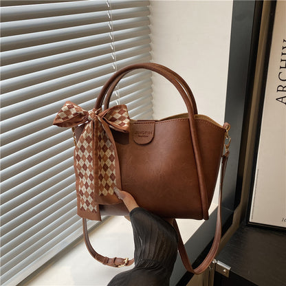 Elegante Schleifenakzent-Handtasche Brehn