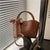 Elegante Schleifenakzent-Handtasche Brehn