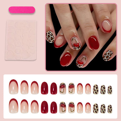 Kunstnagelset mit trendigen Leopard- und Kirschmotiven Brehn