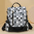 Stylischer Schachbrettmuster-Rucksack