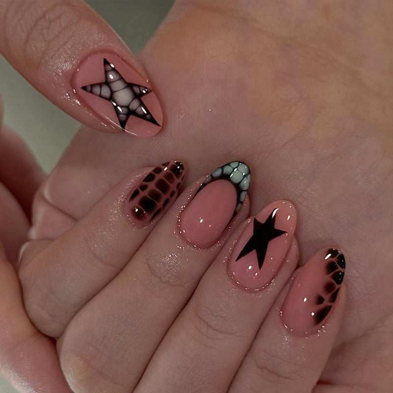 Kunstnagelset mit modernen Stern- und Tiermotiven Brehn