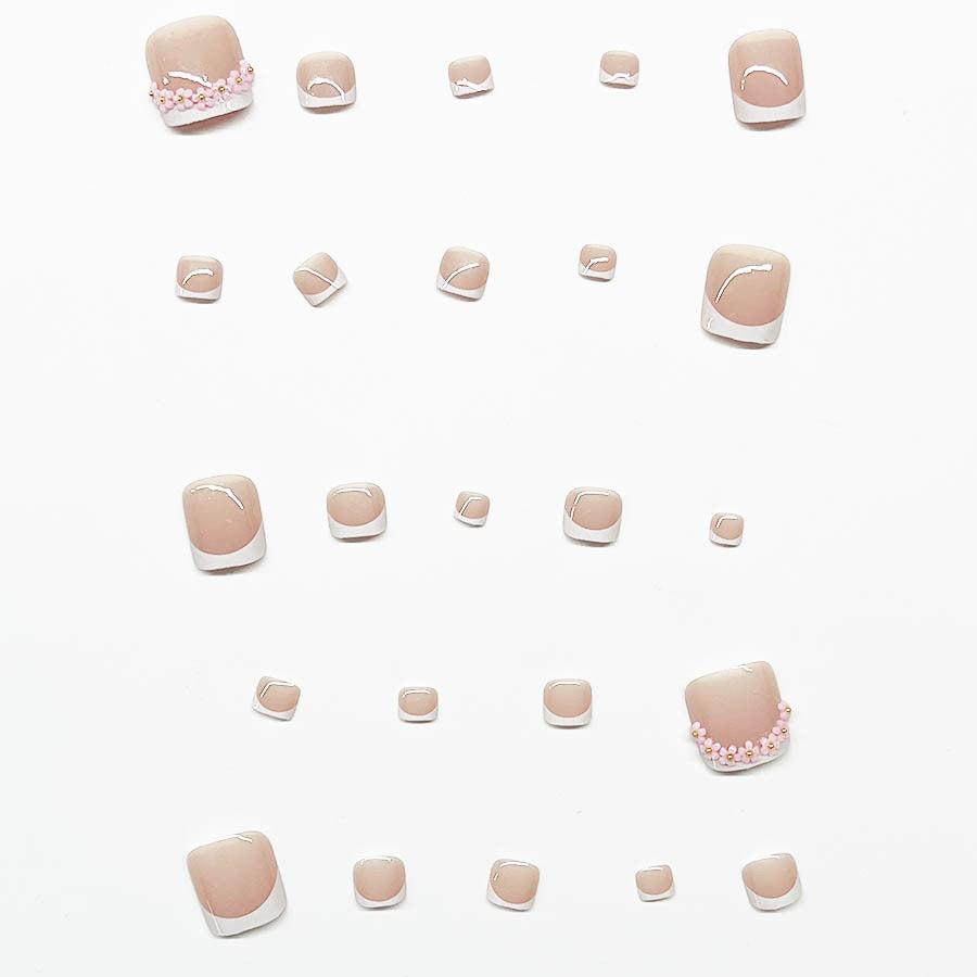 Fußnagelkunstset mit elegantem French Design und Glamourösen Strassakzenten Brehn