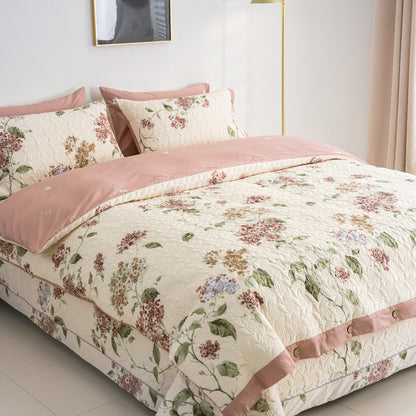 Umkehrbare gesteppte Blumendecke Set mit Knopfbesatz und passenden Kissenbezügen