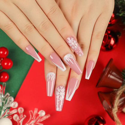 Kunstvolle Stiletto-Nägel mit Schneeflocken-Motiv Brehn