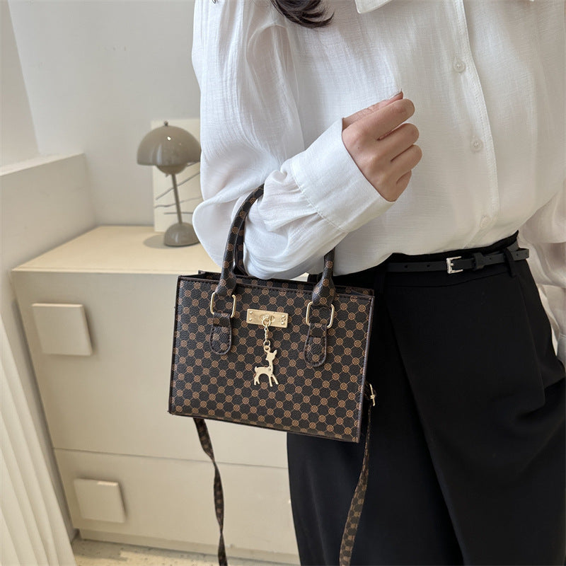 Elegante gemusterte Handtasche