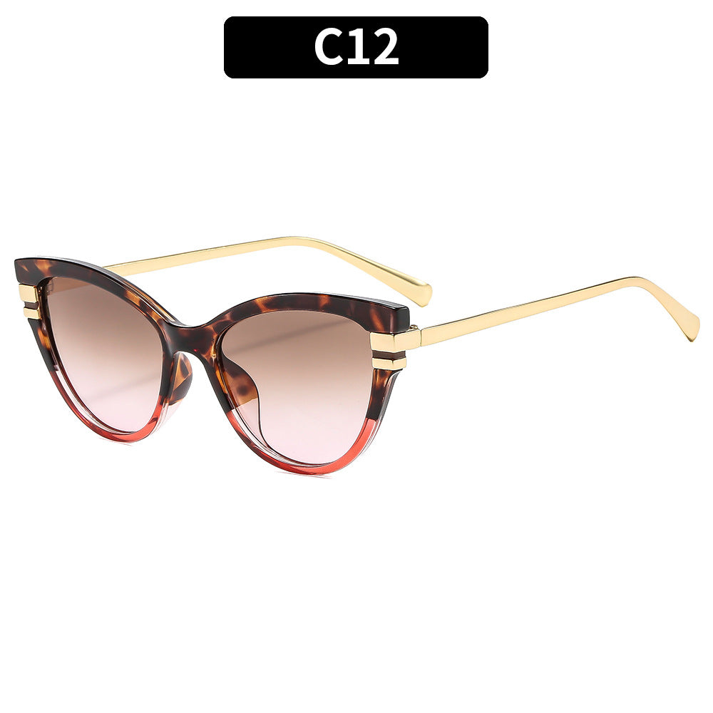 Stylische Cat-Eye Sonnenbrillen mit dekorativen goldenen Akzenten