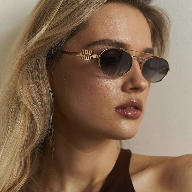 Damen elegante ovale Sonnenbrille mit luxuriösem Metallrahmen Brehn