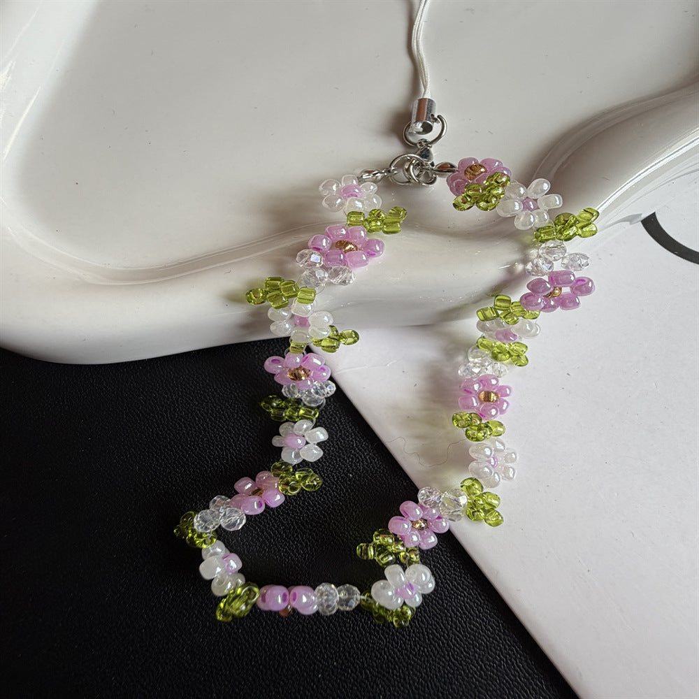 Blumiger Perlenbrillenhalter Brehn