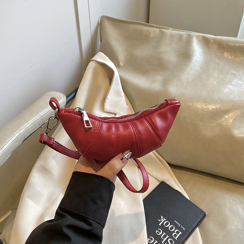 Texturiertes Mini Crossbody Täschchen Brehn
