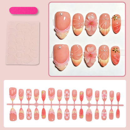 Kunstnagelset mit eleganten floralen Verzierungen und luxuriösem Glanz Brehn