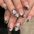 Elegante florale Spitzen-Nagelkunst-Wickel Brehn