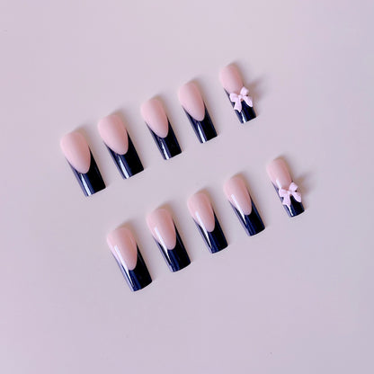 Kunstvolle Nagelverlängerungen mit Schleifen-Design Brehn
