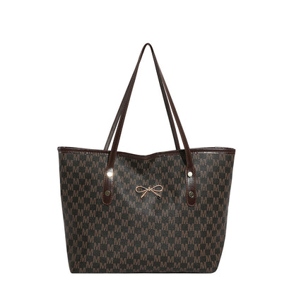 Stylische Flockmuster-Tasche mit dekorativem Bogen